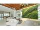 Hotel Lobby featuring comfortable seating, a unique green wall, modern ceiling fans, and lots of light at 225 Sands Point Rd # 7205, Longboat Key, FL 34228