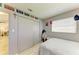 Bedroom with closet and window, decorated with wall decorations at 237 Saxon Cir, Venice, FL 34293