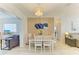 Cozy dining area featuring a modern table set, perfect for intimate meals at 237 Saxon Cir, Venice, FL 34293
