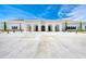 The Venice Library features a grand entrance with arched doorways and a spacious plaza at 237 Saxon Cir, Venice, FL 34293