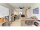 Living room with desk and chair, sliding barn door, and sitting area at 237 Saxon Cir, Venice, FL 34293