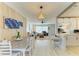 Bright and airy living room featuring a dining area and stylish decor at 237 Saxon Cir, Venice, FL 34293