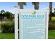 Dog park rules sign listing regulations for residents and guests at 2586 Wild Cherry Path, Sarasota, FL 34240