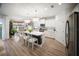 Bright and spacious kitchen with a large island, white cabinetry, and modern appliances at 2586 Wild Cherry Path, Sarasota, FL 34240