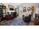 Well-appointed home office with a desk, chair, and sports memorabilia at 2586 Wild Cherry Path, Sarasota, FL 34240