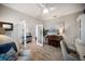 Bright office space featuring a decorative glass paneled divider and piano at 2586 Wild Cherry Path, Sarasota, FL 34240