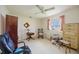 Traditional bedroom featuring a ceiling fan, a window, and furniture at 307 Rubens Dr, Nokomis, FL 34275
