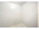 A corner of a room with tiled floor, white paint on the walls and ceiling at 307 Rubens Dr, Nokomis, FL 34275