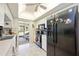 Bright kitchen with modern appliances and access to the outdoor patio for easy dining at 307 Rubens Dr, Nokomis, FL 34275