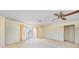 Bright living room with ceiling fan, closet and large windows provide plenty of natural light at 307 Rubens Dr, Nokomis, FL 34275