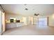 Spacious living area with open access to the kitchen, perfect for entertaining and Gathering gatherings at 307 Rubens Dr, Nokomis, FL 34275