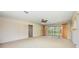 Spacious living room with sliding glass doors that provide natural light and access to the outdoors at 307 Rubens Dr, Nokomis, FL 34275