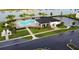 A picturesque aerial view captures the community pool, pavilion, and lush landscaping, with ample parking and a peaceful atmosphere at 3813 Willow Branch Pl, Palmetto, FL 34221