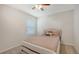 Bedroom with plush carpet, neutral walls, and a cozy double bed at 3813 Willow Branch Pl, Palmetto, FL 34221