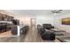 Open-concept living space with kitchen, dining, and living areas at 3813 Willow Branch Pl, Palmetto, FL 34221