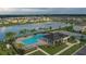 Stunning community pool featuring a covered pavilion, ample seating, and a tranquil lake view, perfect for relaxation and recreation at 3813 Willow Branch Pl, Palmetto, FL 34221