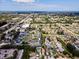 Aerial view showcases the community, water features, nearby roads, and surrounding landscape at 4214 38Th W St, Bradenton, FL 34205