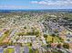 Wide aerial view of a residential community featuring numerous homes, ponds, and tree-lined streets at 4214 38Th W St, Bradenton, FL 34205