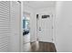 Bright entryway with wood-look floors, a closet, and view of a bedroom in this well-maintained home at 4214 38Th W St, Bradenton, FL 34205