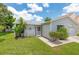 Charming home with a well-maintained front yard, landscaped with greenery and an attached garage at 4214 38Th W St, Bradenton, FL 34205