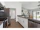 Modern kitchen with stainless steel appliances, granite countertops and hardwood flooring at 4214 38Th W St, Bradenton, FL 34205