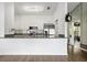 Bright, open kitchen with stainless steel appliances, granite countertops and hardwood flooring at 4214 38Th W St, Bradenton, FL 34205