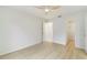 This bedroom features wood-look floors and easy access to the closet at 4250 Winfall Ave, North Port, FL 34286