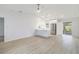 Bright living space showcasing a stylish, modern kitchen with stainless steel appliances and ample storage at 4250 Winfall Ave, North Port, FL 34286