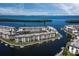 Exclusive waterfront condos feature direct canal access and private boat docks for a luxury lifestyle at 4420 Exeter Dr # 303, Longboat Key, FL 34228