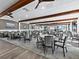 Large banquet room with ample seating, neutral colors, and a scenic view at 4420 Exeter Dr # 303, Longboat Key, FL 34228