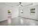 Spacious main bedroom features trey ceilings, tile floors, and lots of natural light at 4855 Dragon St, North Port, FL 34288