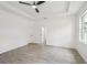Spacious main bedroom features trey ceilings, tile floors, and a closet at 4855 Dragon St, North Port, FL 34288