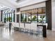 Stylish dining room with seating for ten and beautiful views at 4907 Topsail Dr, Nokomis, FL 34275