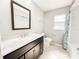 Bathroom featuring a single sink vanity, and a tub with a shower at 4913 32Nd E St, Bradenton, FL 34203