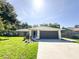 Charming single-story home with a well-manicured lawn and a two-car garage at 4913 32Nd E St, Bradenton, FL 34203