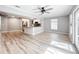 Sun-drenched living room featuring wood-look floors and open layout at 4913 32Nd E St, Bradenton, FL 34203