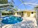 Beautiful screened-in pool with attached patio is perfect for entertaining or relaxation at 4913 32Nd E St, Bradenton, FL 34203