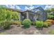 Enjoy outdoor living with a screened lanai overlooking lush greenery and flowering plants at 5234 Napoli Run, Bradenton, FL 34211
