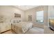 Serene bedroom with a decorative headboard, patterned bedding, and a classic-style dresser at 5234 Napoli Run, Bradenton, FL 34211
