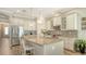 Bright kitchen with stainless steel appliances and spacious center island at 5234 Napoli Run, Bradenton, FL 34211