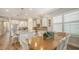 Gourmet kitchen boasts stainless steel appliances, an island with bar seating, and plenty of natural light at 5234 Napoli Run, Bradenton, FL 34211