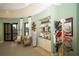 Charming lobby area with comfortable seating, decorative displays, and elegant decor at 5234 Napoli Run, Bradenton, FL 34211