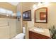 Comfortable bathroom with walk-in shower and granite countertops at 6155 Aviary Ct, Bradenton, FL 34203