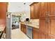 Spacious kitchen featuring granite countertops, stainless appliances, and ample cabinet space at 6155 Aviary Ct, Bradenton, FL 34203