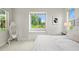 Bright bedroom with a window seat overlooking the backyard at 6216 Donnington Ct, Sarasota, FL 34238