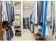 Spacious walk-in closet featuring custom shelving and ample storage space for clothes, shoes, and accessories at 6216 Donnington Ct, Sarasota, FL 34238