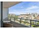 Balcony with seating area overlooking buildings with the ocean view at 6415 Midnight Pass Rd # 502, Sarasota, FL 34242