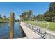 Private dock area with boat access offers waterfront living at 6415 Midnight Pass Rd # 502, Sarasota, FL 34242