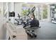 Fitness center with various equipment, weights, and chairs with a view at 6415 Midnight Pass Rd # 502, Sarasota, FL 34242