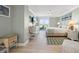 Bright main bedroom features a balcony with beautiful views and a coastal decor at 6415 Midnight Pass Rd # 502, Sarasota, FL 34242